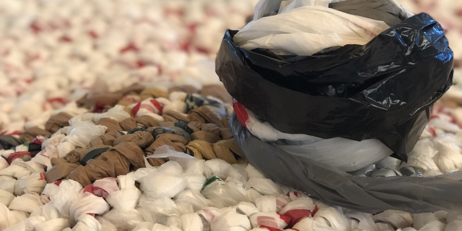 M. Holland Community Plarns Plastic Bags Into Mats For Homeless