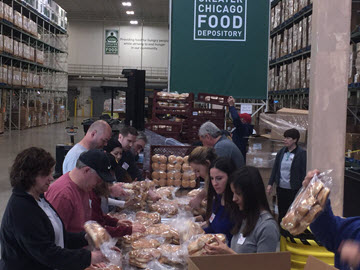 M. Holland Helping Chicago Food Depository