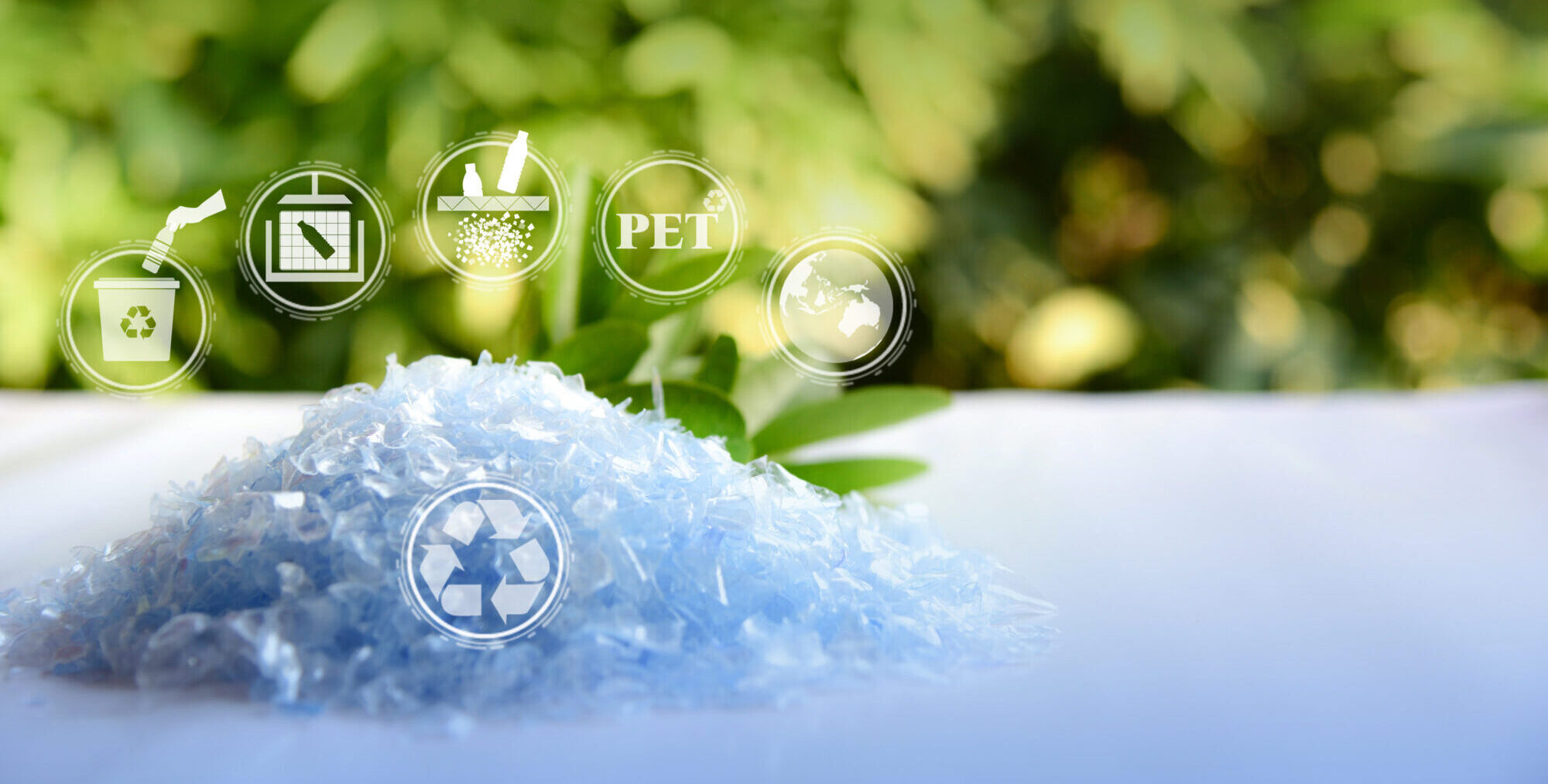 Recycled PET resin flakes with recycling process icons, showcasing sustainable plastics, circular economy practices and thermoplastic resin distribution.