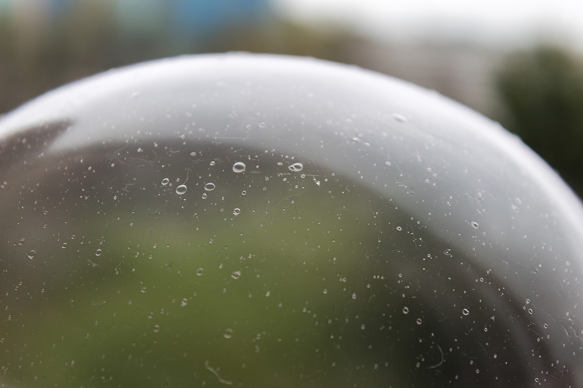 Close‑up of a plastic part showing trapped air bubbles, illustrating common injection molding defects and troubleshooting methods.